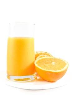 Orange juice with orange slices over white isolated background