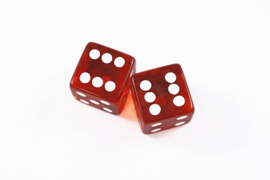 Red dices over white isolated background