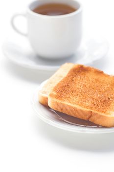 tea and toast isolated on white