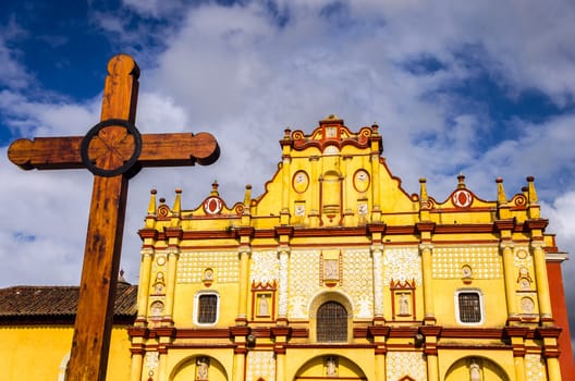The colorful cathedral and cross in San Cristobal de las Casas in Chiapas, Mexico