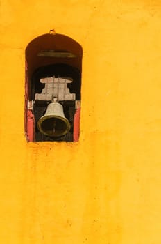 Bell tower in the yellow cathedral in San Cristobal de las Casa in Chiapas, Mexico