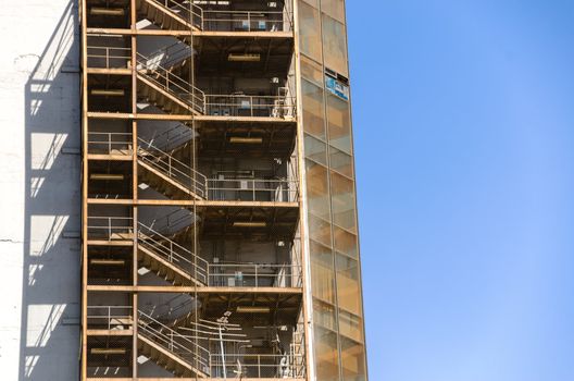 A fire escape running down the side of a building in Mexico City