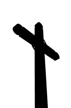 A black and white silhouette of a large cross