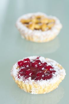 beautiful cake with berries on a glass table