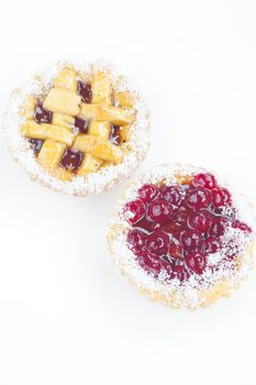 beautiful cake with berries on a white background