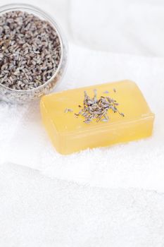 soap and lavender on a white towel