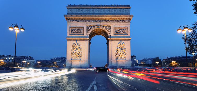 Panoramic view of Arc de Triomphe by night, France