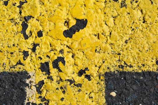 Abstract yellow and black  background  from road close up