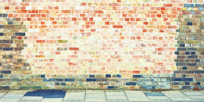 Brick wall and paving as a low contrast background image