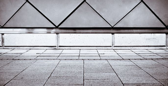 Modern wall and paving stones in dramatic black and white