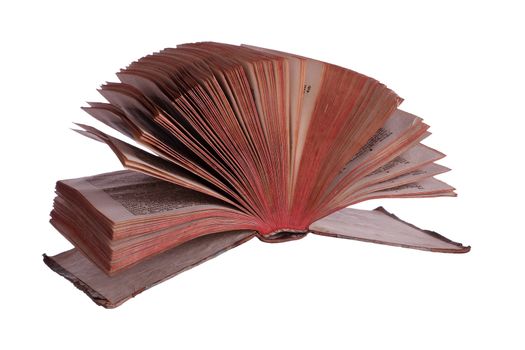 old historic book with fanned pages on white
