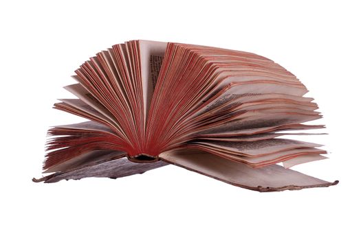 historic book with fanned pages on white