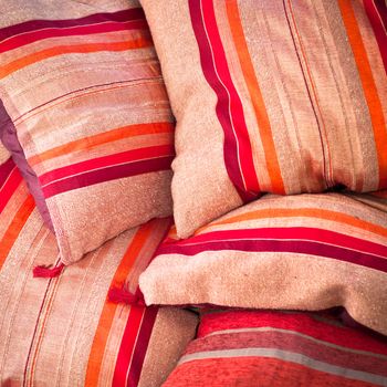 Close up image of colorful moroccan cushions