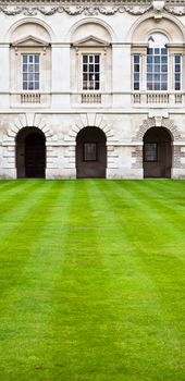 Neat lawn and classic architecture at a Cambridge University college, UK