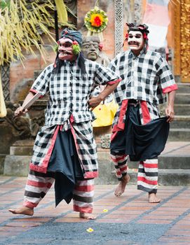 UBUD, BALI, INDONESIA - SEP 21: Actors in masks of Barong Dance show, the traditional balinese performance on Sep 21, 2012 in Ubud, Bali, Indonesia. The show is popular tourist attraction on Bali.