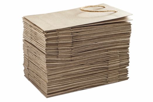 Stacked paper bags isolated on white background