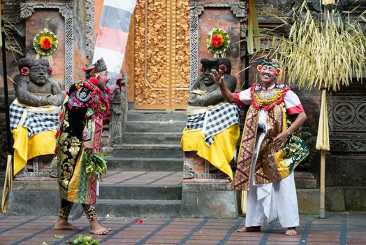 UBUD, BALI, INDONESIA - SEP 21: Actors perform advisers characters on traditional balinese performance Barong on Sep 21, 2012 in Ubud, Bali, Indonesia. Barong show is popular tourist attraction on Bali