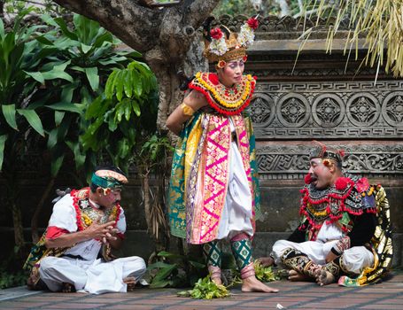 UBUD, BALI, INDONESIA - SEP 21: Actors perform heroic sacrifice scene on traditional balinese Barong dance show on Sep 21, 2012 in Ubud, Bali, Indonesia. The show is popular tourist attraction on Bali