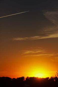 setting sun and sky with clouds