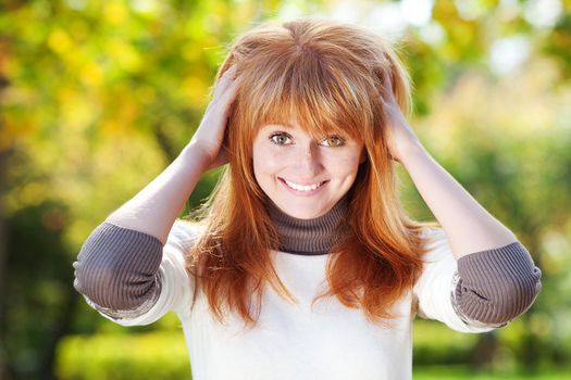 portrait of a beautiful young redhead teenager woman 