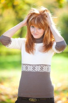 portrait of a beautiful young redhead teenager woman 