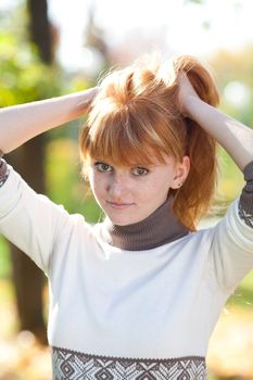 portrait of a beautiful young redhead teenager woman 