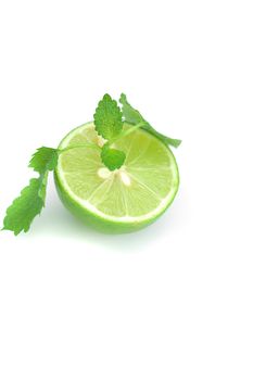 half of lime and mint isolated on white