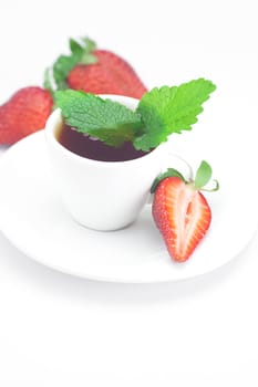 cup of tea,strawberry and mint isolated on white