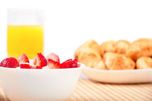 Breakfast with berries,orange juice and croissant, early breakfast