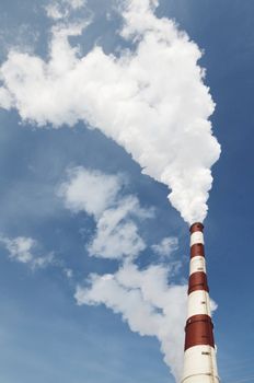 hi industrial smoke from chimney on blue sky 
