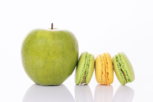 green apple with green and yellow macaroons