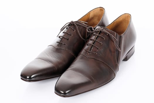 Brown shoes isolated on the white background in studio
