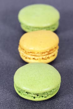 green and yellow macaroons in kitchen