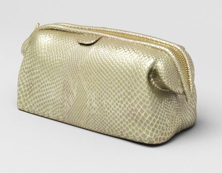 Leather clutch closeup on a light background