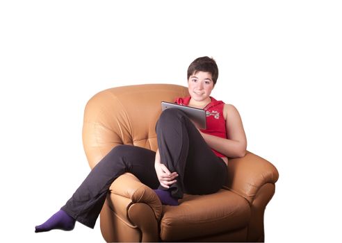 A girl with a clipboard in the yellow-brown armchair on a white background