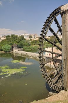 A noria is a machine for lifting water into a small aqueduct, either for the purpose of irrigation or, in at least one known instance, to feed seawater into a saltern.