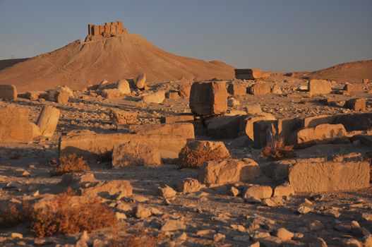 Fakhr-al-Din al-Ma'ani Castle or Palmyra Castle is a castle on a high hill overlooking the site of Palmyra, and named for the Druze emir Fakhr-al-Din II, who extended the Druze domains to the region of Palmyra during the 16th century. The castle was probably built by the Mamluks in the 13th century. The castle was surrounded by a moat, with access only available through a drawbridge.