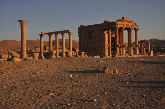 The most striking building in Palmyra is the huge temple of Ba'al, considered the most important religious building of the first century AD in the Middle East. It originated as a Hellenistic temple, of which only fragments of stones survive.