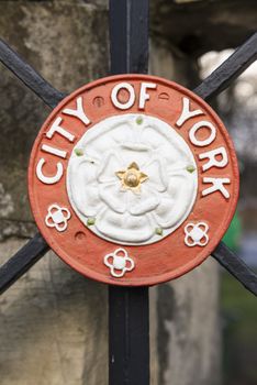 YORK, UK - MARCH 30: City of York crest in one of the metal gates in the city walls. March 30, 2013 in York.
