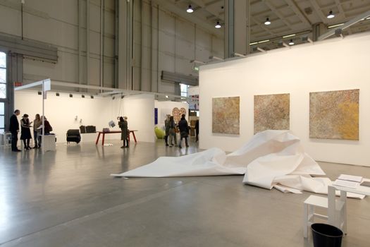 People visit paintings gallery at MiArt, international exhibition of modern and contemporary art April 07, 2013 in Milan, Italy.