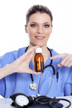 doctor with medicine bottle in the hand