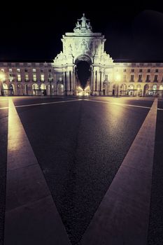 famous stone arch at commerce square at Lisbon by night