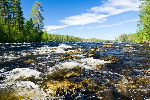 Close-up shot of rapids on the Pistojoki river in Karelia, Russia
