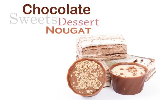 Chocolate and nuts over white