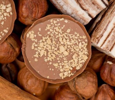Closeup of coffee beans, cinnamon and nuts