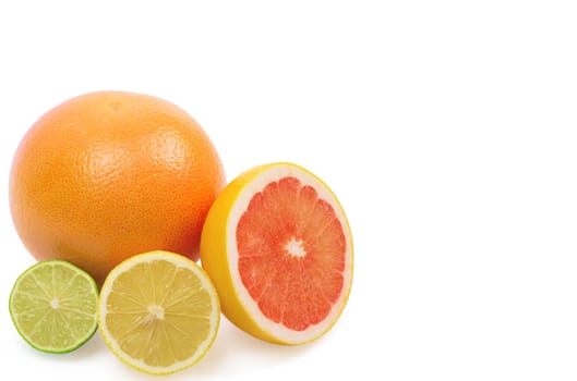 Image of a fresh whole lime, lemon and orange isolated on white