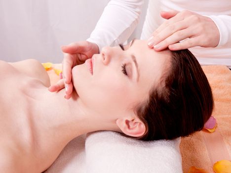 young attractive smilig woman doing wellness spa relaxing massage
