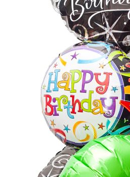 Colorful birthday balloons on a white background