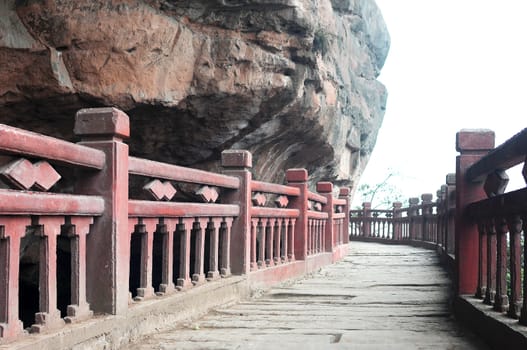 Tour road under cliff in Sichuan China