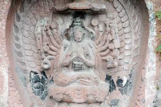 Ancient Buddha statue in caves in Sichuan, China